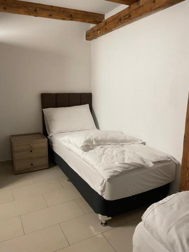 Single Bed in Female Dormitory Room