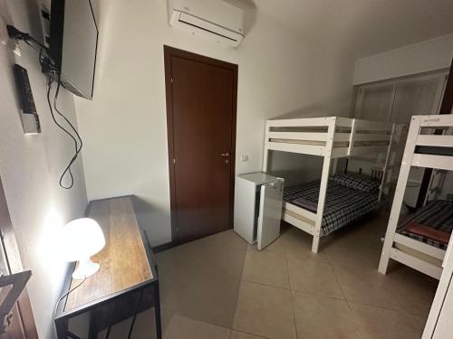 Gigli, rooms con cucina in comune e terrazza