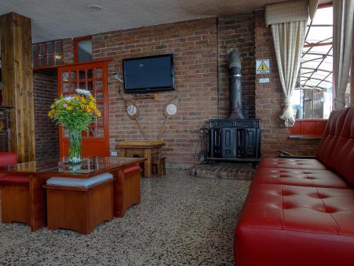 Közös társalgó / TV, Hotel Refugio Santa Ines in Cuitiva