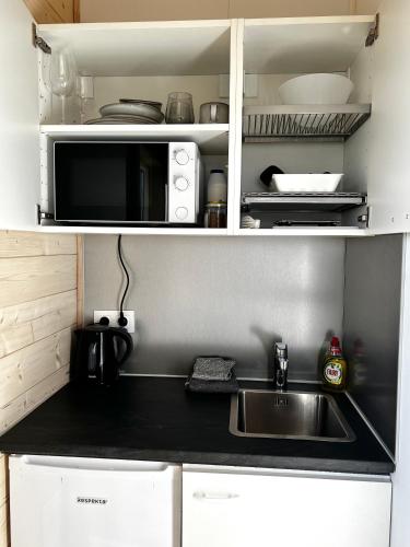 Küche, REY Stays - Small & Cozy Studio in Hornafjordur