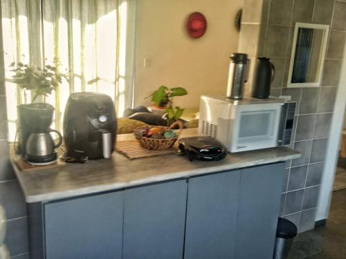Kitchen, Apartamento em Guaruja Praia do Tombo, 300mts do mar - TOMBO BEACH HOST near Quiosque Dinho's