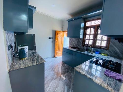 Kitchen, Sunset Chalet in Mullaittivu