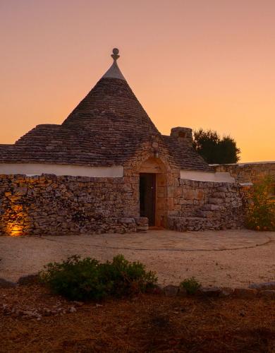 Trullo Elaia - Dimora di charme in Valle d'Itria con piscina