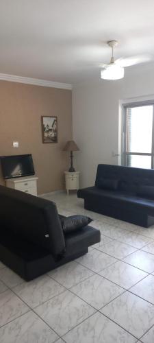 Apartamento com 4 quatros em frente a praia em Pitangueiras - Guaruja near Padaria Bella Guaruja