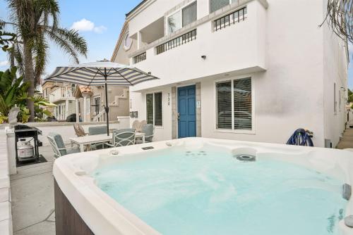 Stunning Beach Delight with Hot Tub, Fire Pit, Parking & Walk to Beach!