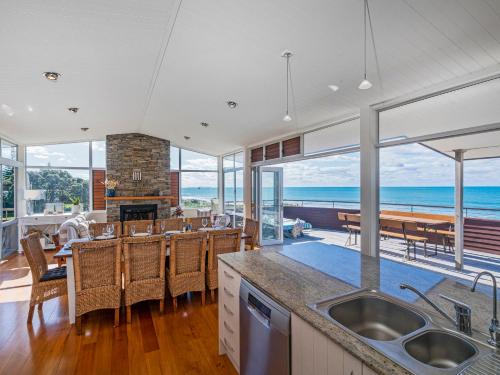 Absolute Beachfront Paradise - Whiritoa Beach Home photo 4