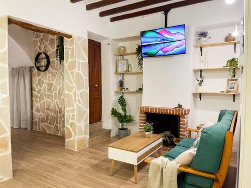 Közös társalgó / TV, Casa Rural La Travesía (Casa Rural La Travesia) in Bolulla