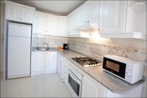 Kitchen, Apartamentos Lomas De Campoamor in Torrevieja