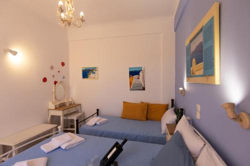 Villa Michalis Room Type - Triple Room with Pool View Villa Michalis Room Type - Triple Room with Pool View