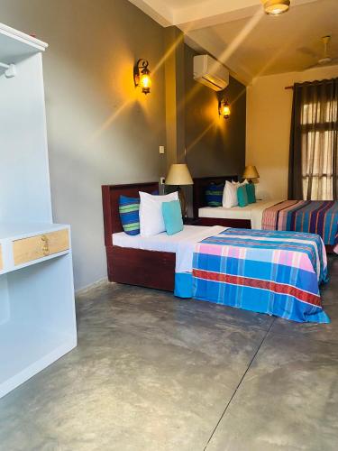 Standard Triple Room with Garden View image 2