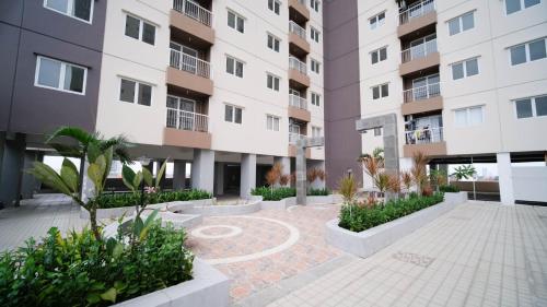 Exterior view, Best Choice 2BR at Puncak Dharmahusada Apartment Surabaya By Travelio near Warung ana jaya