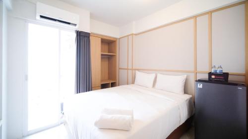 Studio Apartment at Suncity Residence Sidoarjo near Suncity Mall By Travelio