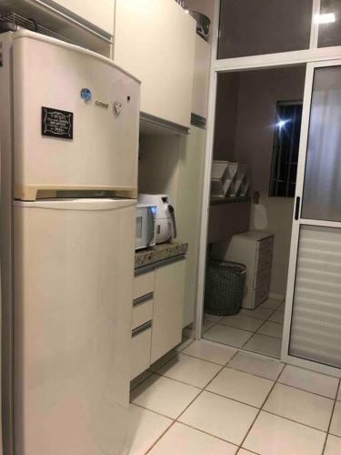 مطبخ, Hospedagens Express Cuiabá Apartamento Lisboa (Hospedagens Express Cuiaba Apartamento Lisboa) in Jardim Ubirajara