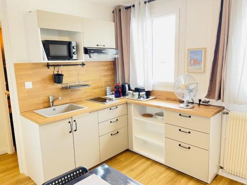 Cocina, LAppart de Gauche Confort en ville avec parking privé (LAppart de Gauche Confort en ville avec parking prive) in Le Creusot