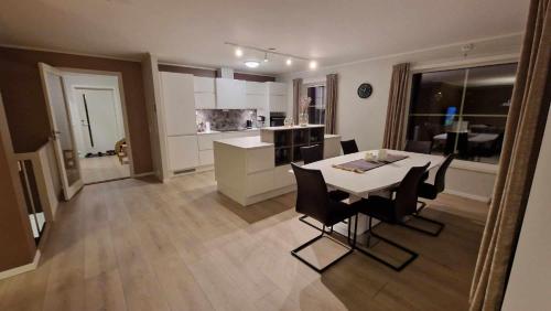 Kitchen, A Modern Home in Nature's Embrace in Kvaloysletta