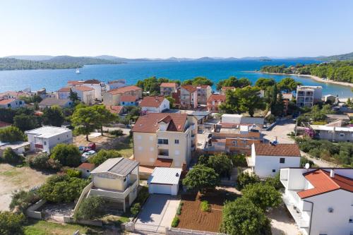 Apartments by the sea Pirovac, Sibenik - 15659