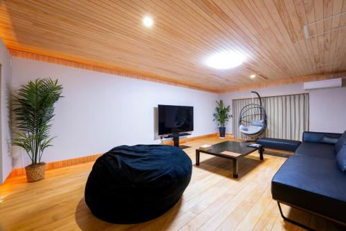 Shared lounge/TV area, Hinoki house in Fukuoka
