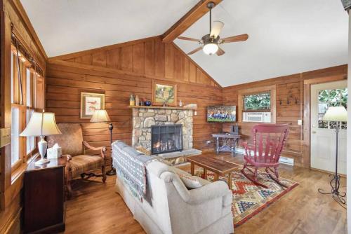 Log cabin on peaceful river in Blowing Rock, USA