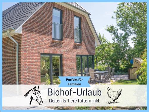 Bio Ferienhof Wichtelweide - Ferienhaus Luv - mit Sauna – khách sạn tại Fehmarn