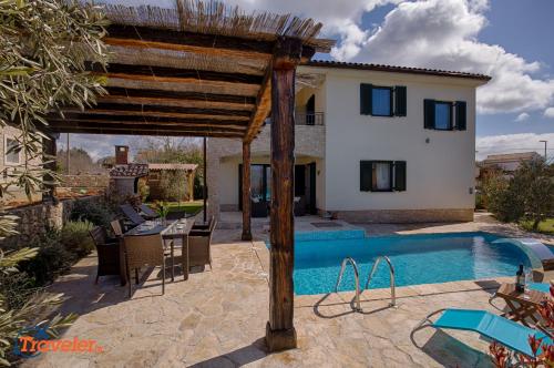 New villa with swimming pool, olive grove and sea view by Traveler tourist agency Krk ID 2201