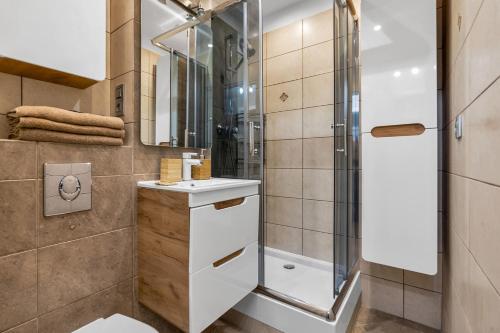 Żelazna Center Comfort Apartments by Rentujemy, Varsovie (photo 9)