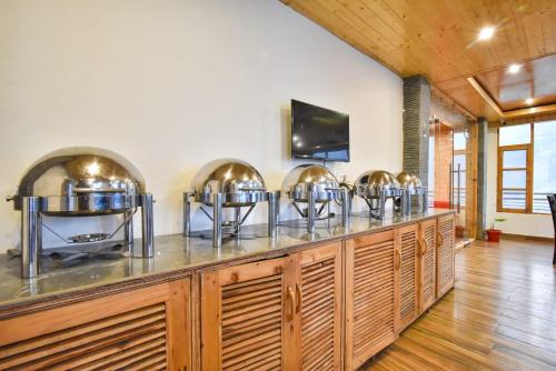 ห้องอาหาร, The Bliss Cottages and Apartment villa in หมู่บ้านซิมซา