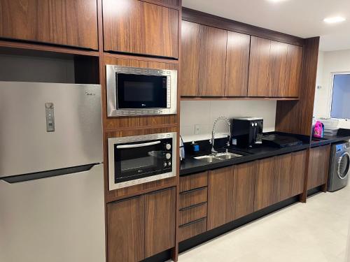 ห้องครัว, Apartamento São Francisco - Praia do Gravatá - Beto Carrero World (Apartamento Sao Francisco - Praia do Gravata - Beto Carrero World) in กราวาตา