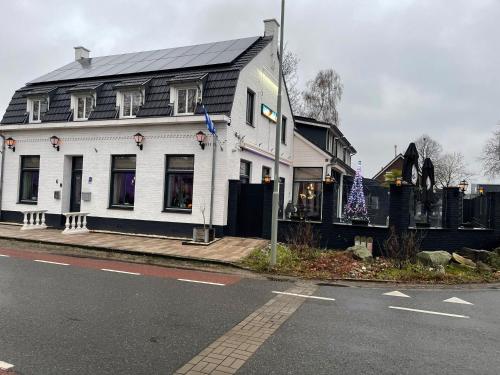 A szálláshely kívülről, B&B Santorini Maasbree in Verspreide huizen op Den Hert