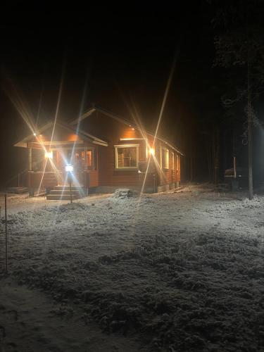 Lomanaamanka Naava-Cottage / Naava-hirsimökki