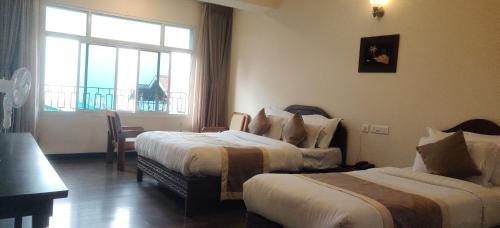 Deluxe Triple Room image 4