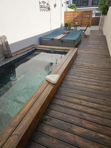 Tiny Badamier Blanc appartement 4 étoiles 2 à 4 personnes piscinelle chauffée - Location saisonnière - Saint-Paul