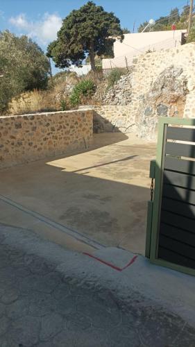 Stone Serenity,2BR Home in Sellia with Dreamy Sea Views - Tap to explore photos