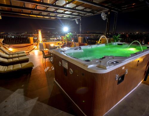 Swimming pool, JOHNWOOD HOTEL by Bolton in Abuja