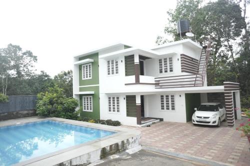 ฝักบัว, Luxe Hotel - Rooms & Villas Wayanad in อัมพลวายัล