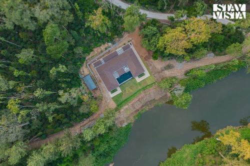 Mudra Manor- River View Villa with Comp Breakfast, Heated Pool and Jacuzzi by StayVista photo 1
