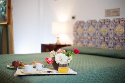 Grand Hotel De Rose Grand Hotel De Rose is a popular choice amongst travelers in Scalea, whether exploring or just passing through. The hotel offers guests a range of services and amenities designed to provide comfort an