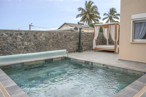 La villa Grand Bois avec sa piscine chauffée - Location, gîte - Saint-Pierre