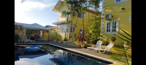 Luxury 5-Bed Villa in Tobago The Big Yellow House