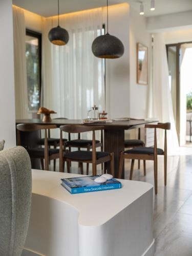 Beachfront Linum Escape Retreat with a Heated Pool - Tap to explore photos