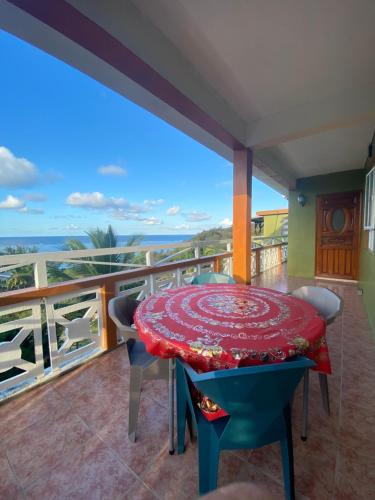 شرفة/ تراس, La Rosedepine chez Mariani chez l'habitant in Roche Bon Dieu