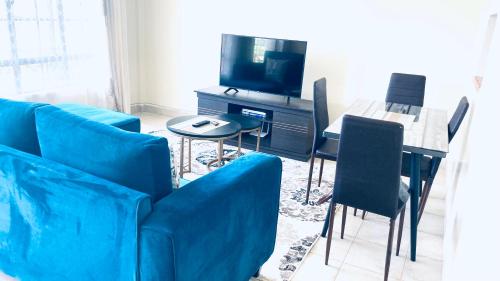 Koplietošanas atpūtas telpa ar TV, STUDIO MAIYAN in Busia