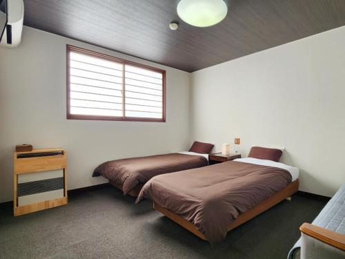 Twin Room with Shared Bathroom - Non-Smoking