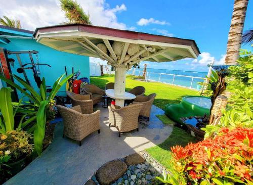 Corner Luxury Ethereal Hawaii Beachfront Estate for Monthly Rental with Private Beach & 3 Beachfront Jacuzzis & Snorkeling Reef & Jurassic Park Film Site