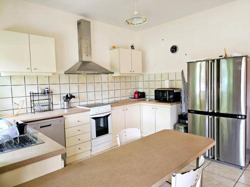 Maison en bois au Mont mou in Paita