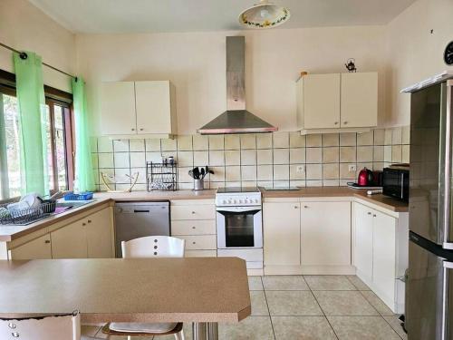 Maison en bois au Mont mou in Paita