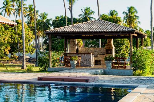 Casa em Condomínio/ Piscina Churrasqueira privativas / Frente ao Mar / Gostoso RN