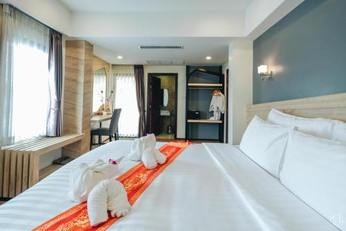 Porpiang Hotel - โรงแรมพอเพียง