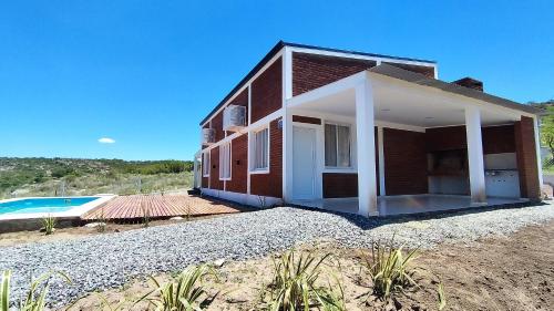 Cabañas Estancia del Pilar - Cabañas de montaña