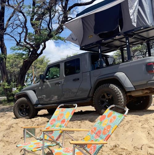 Embark on a journey through Maui with Aloha Glamp's jeep and rooftop tent allows you to discover diverse campgrounds, unveiling the island's beauty from unique perspectives each day