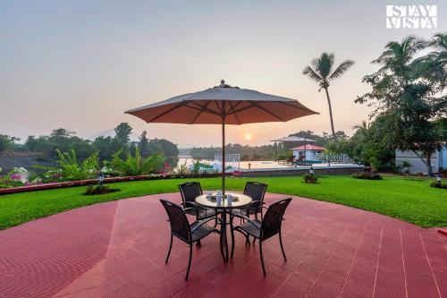 StayVista's Waterway Retreat - Lakeside Oasis with Infinity Pool